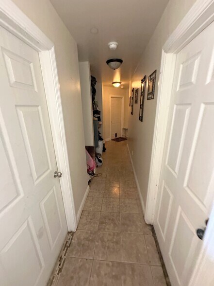 More Photos Of 9123 Orchard Ave, Los Angeles Multifamily For Sale