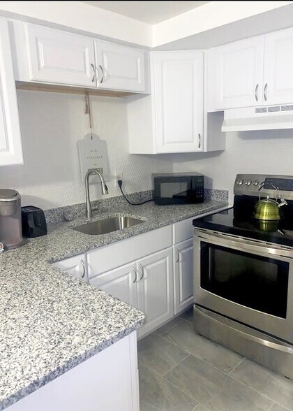 More Photos Of 1630 N Pontiac Trl, Walled Lake Apartments For Sale