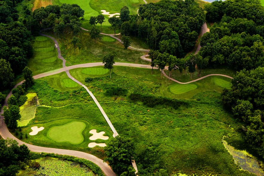 More Photos Of 61809 Stonegate Dr, Centreville Golf Course Driving Range For Sale