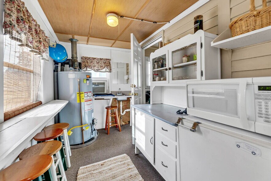 More Photos Of 104 State St, Greensboro Freestanding For Sale