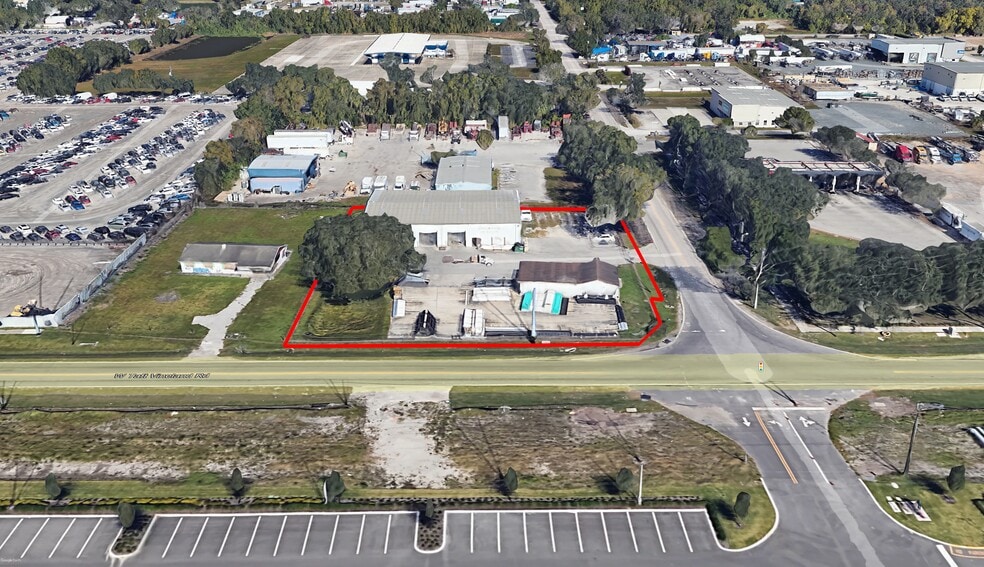 Primary Photo Of 9990 Sidney Hayes Rd, Orlando Warehouse For Sale