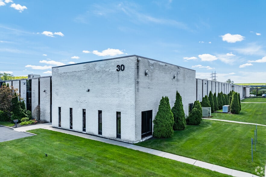 Primary Photo Of 30 Hub Dr, Melville Warehouse For Lease
