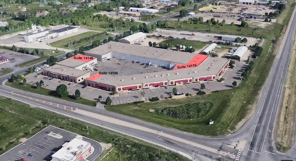More Photos Of 14140-14198 Northdale Blvd, Rogers Showroom For Lease