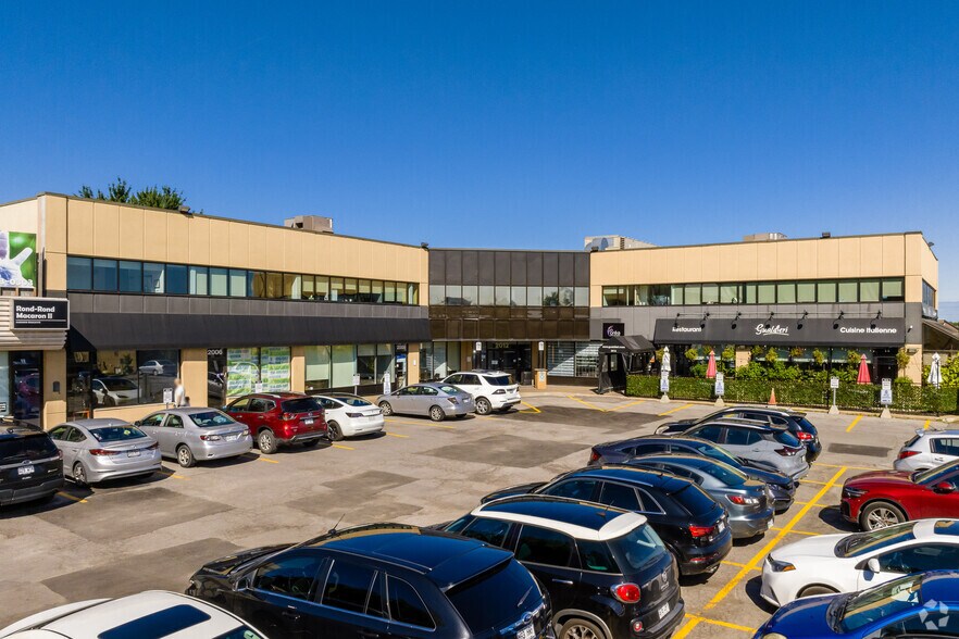 Primary Photo Of 2000-2016 Boul René-Laennec, Laval Storefront Retail Office For Lease