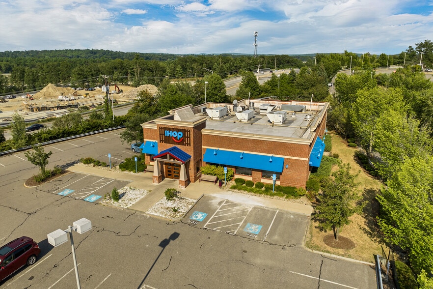 Primary Photo Of 224 S River Rd, Bedford General Retail For Sale