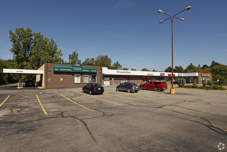 Primary Photo Of 56270-56330 Grand River Ave, New Hudson General Retail For Lease