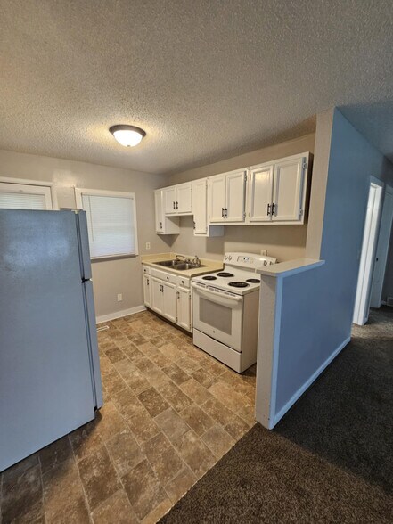 More Photos Of 305 E 25th Street Pl S, Newton Apartments For Sale