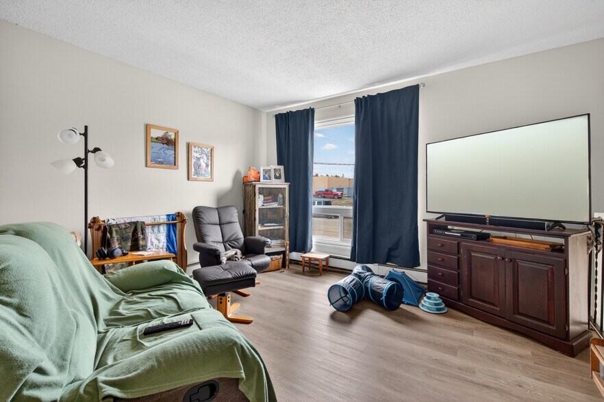More Photos Of 5015 48 St, Legal Apartments For Sale