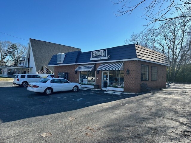 Primary Photo Of 610 E Franklin St, Monroe Drugstore For Sale