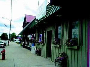 More Photos Of 1099 Wilcox, White Cloud Storefront For Sale
