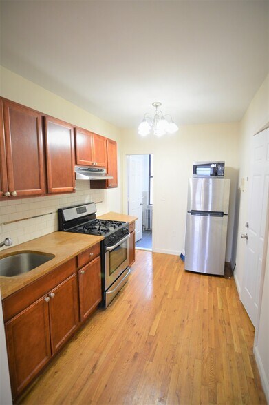 More Photos Of 59-66 56th Ave, Flushing Storefront Retail Residential For Sale