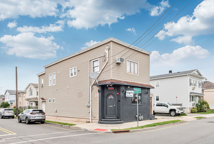 Primary Photo Of 323 Semel Ave, Garfield Storefront Retail Residential For Sale