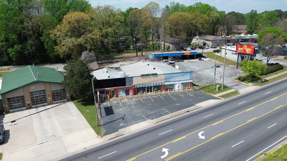 Primary Photo Of 4527 Jonesboro Rd, Forest Park Freestanding For Sale