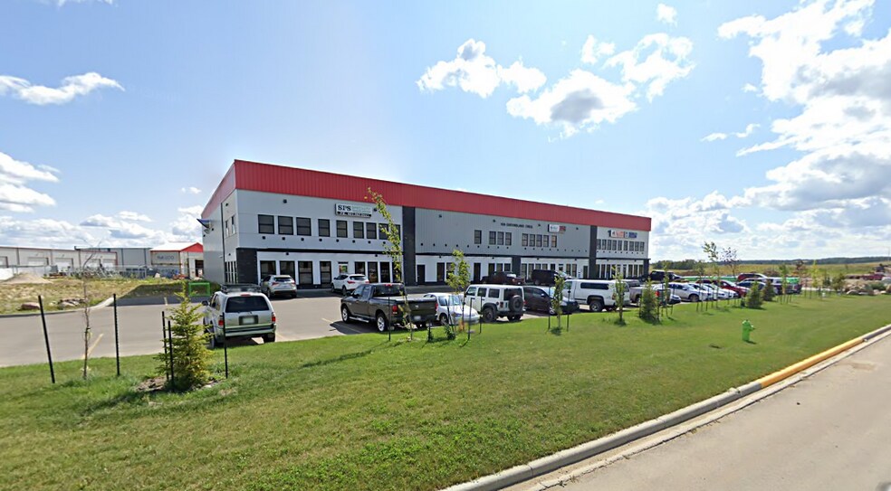 More Photos Of 106 Queensland Cres Bay #150, Red Deer County Light Distribution For Lease