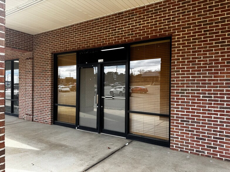 More Photos Of 200 W Clinton St, Gray Storefront For Lease