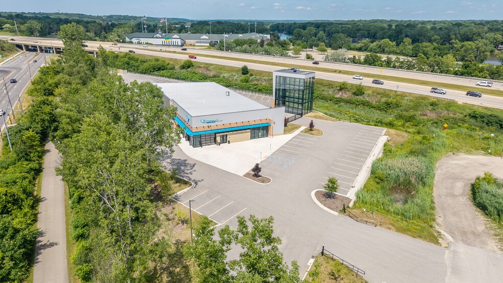 Primary Photo Of 247 Morrissey Dr NE, Comstock Park Auto Dealership For Sale
