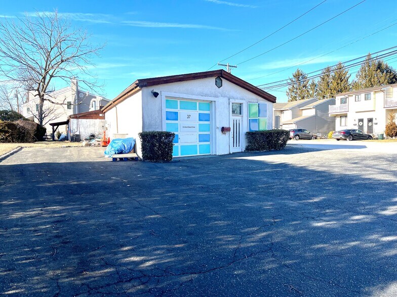 More Photos Of 37 Orchard Beach Blvd, Port Washington Specialty For Sale