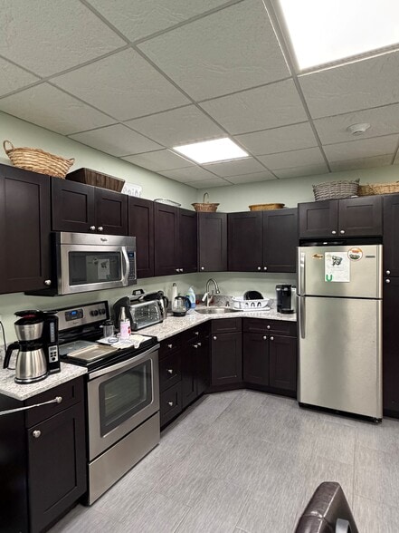 More Photos Of 708 Ginesi Dr, Morganville Warehouse For Sale