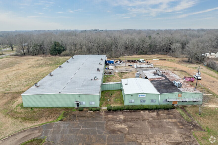 Primary Photo Of 120 Saint Charles Ave, Flora Manufacturing For Sale