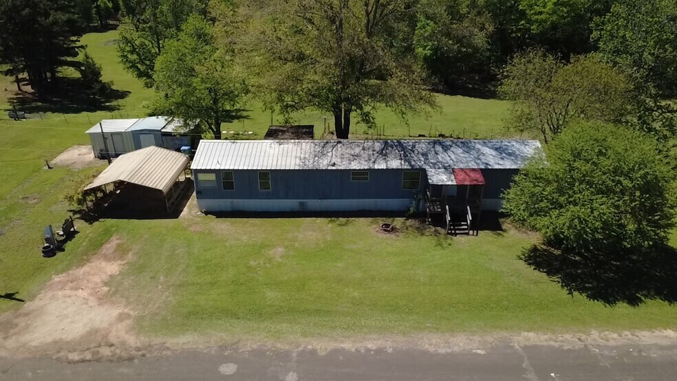 More Photos Of 8719 Pearson Rd, Ore City Warehouse For Sale