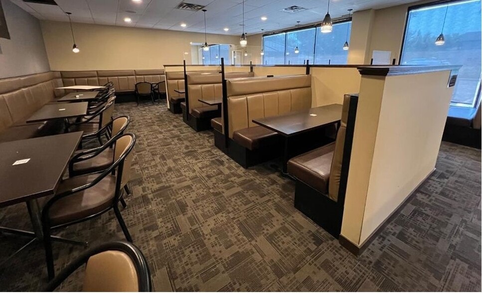 More Photos Of 104 3rd Ave SE, High River Storefront For Sale
