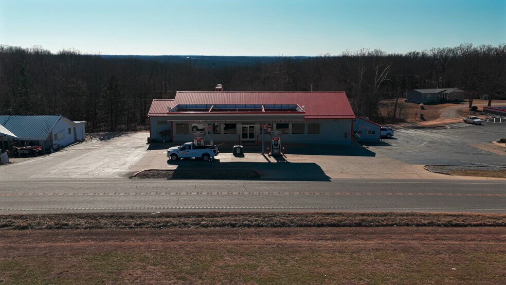 Primary Photo Of 7 Honey Springs Loop, Brumley Service Station For Sale