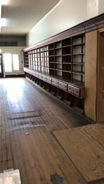 Primary Photo Of 114-120 Washington St, Williamston Storefront Retail Office For Sale