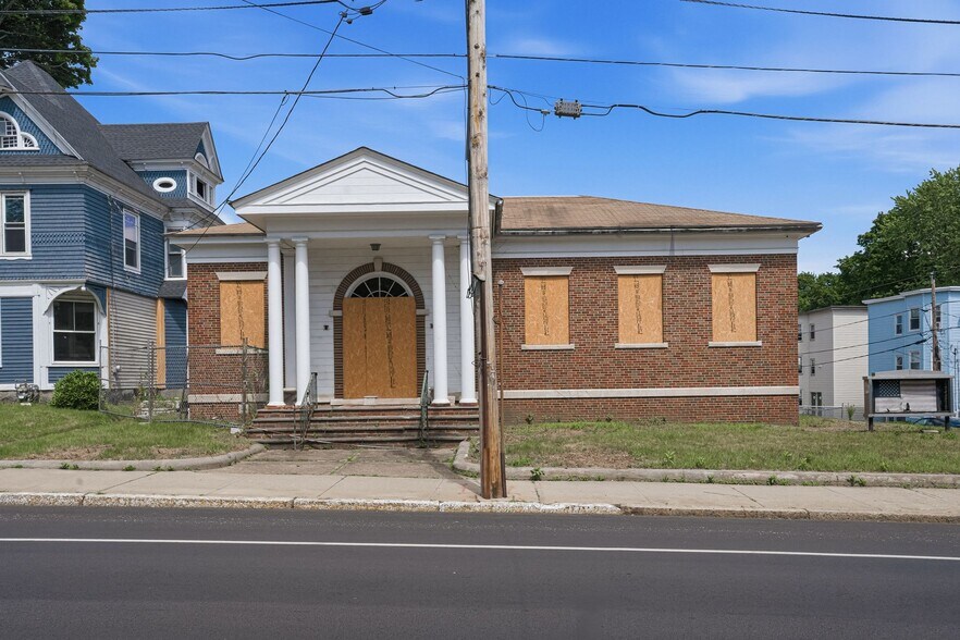 Primary Photo Of 76 Providence St, Woonsocket Mixed Retail For Sale