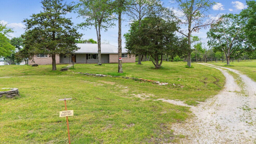 More Photos Of 25421 US-59, Grove Land For Sale