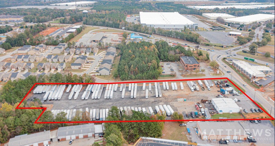 Primary Photo Of 100 Industrial Blvd, McDonough Service For Lease