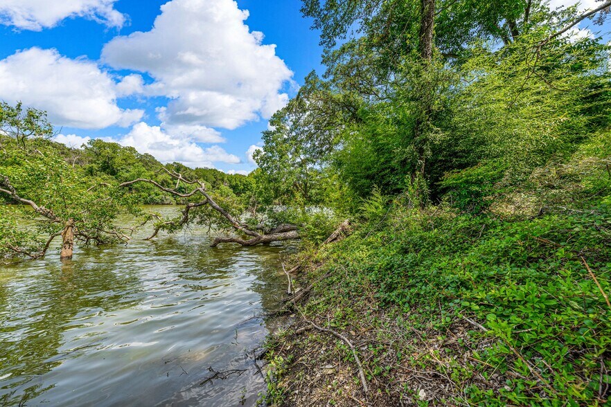 More Photos Of TBD Rainbow Dr, Woodway Land For Sale