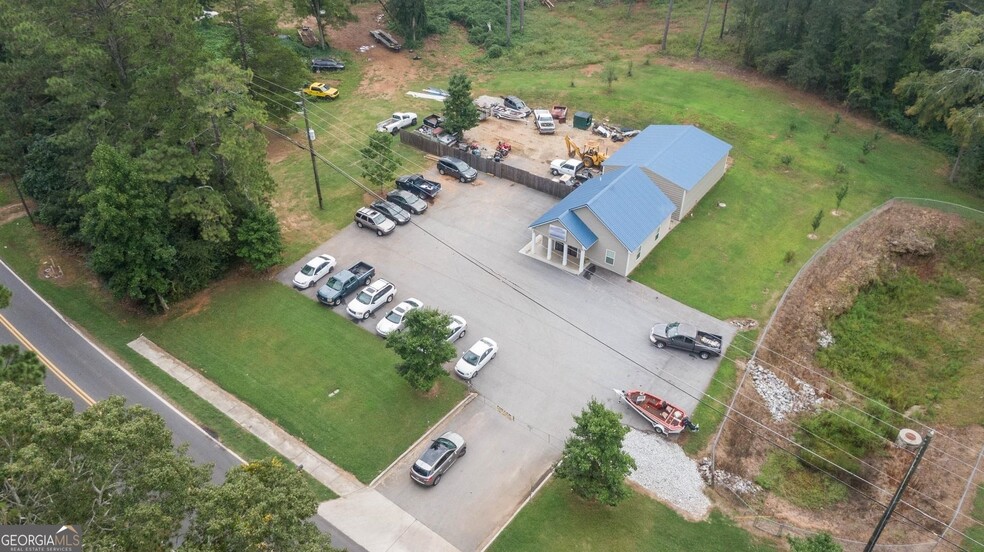 Primary Photo Of 7117 Brown Bridge Rd, Covington General Retail For Sale