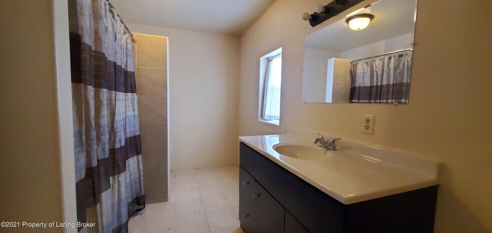 More Photos Of 28 E Main St, Halliday Specialty For Sale