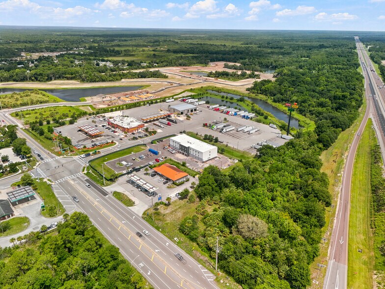 Primary Photo Of 4418 Highway 46, Mims Hotel For Sale
