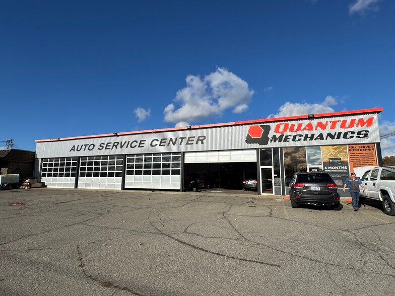 Primary Photo Of 10415 E Sprague Ave, Spokane Valley Auto Repair For Lease