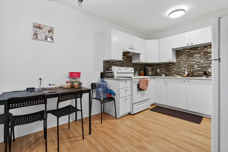 More Photos Of 5015 48 St, Legal Apartments For Sale