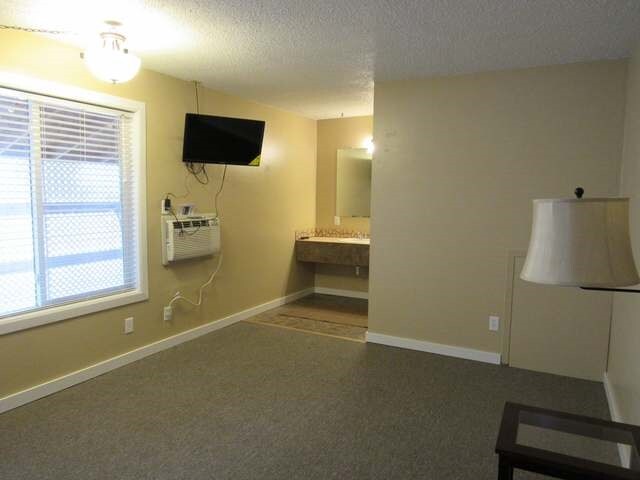 More Photos Of 681 7th St SW, Halliday Hotel For Sale