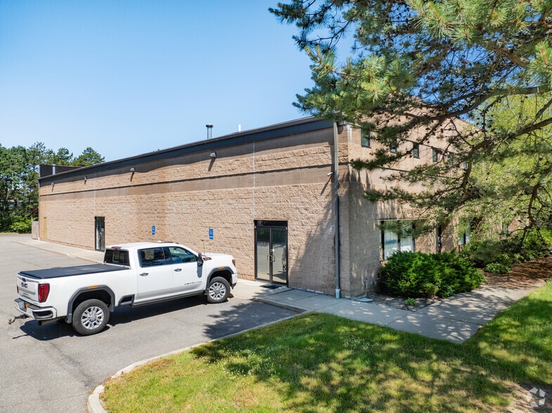 Primary Photo Of 28 Sawgrass Dr, Bellport Village Manufacturing For Sale