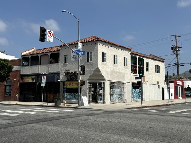 Primary Photo Of 7301-7305 Melrose Ave, Los Angeles Storefront For Sale