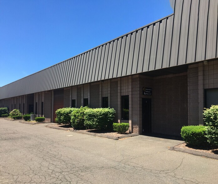 Primary Photo Of 65 N Plains Industrial Rd, Wallingford Light Manufacturing For Sale