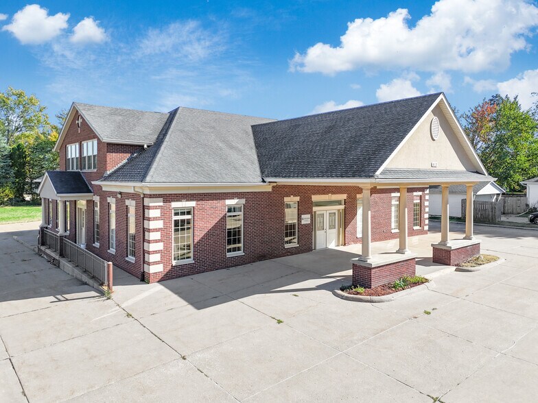 Primary Photo Of 413 S Mississippi, Blue Grass Office For Sale