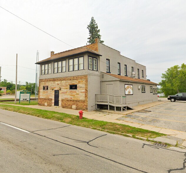 Primary Photo Of 22401 Huron River Dr, Rockwood Bar For Sale