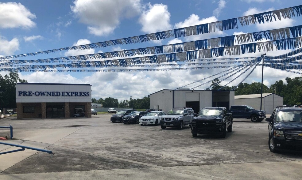 Primary Photo Of 25425 Highway 59, Porter Auto Dealership For Sale