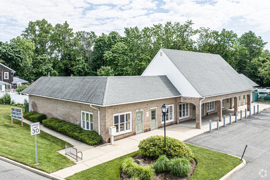 Primary Photo Of 320 Merrick Rd, Amityville Freestanding For Sale