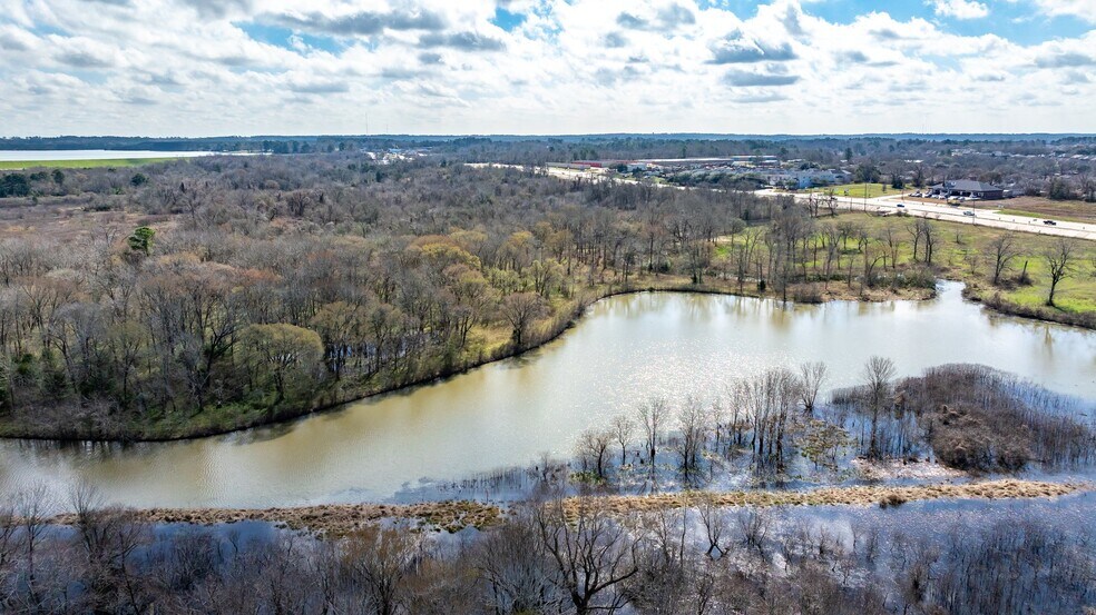 More Photos Of Lake Conroe Hills Dr & FM 1097 W, Willis Land For Sale