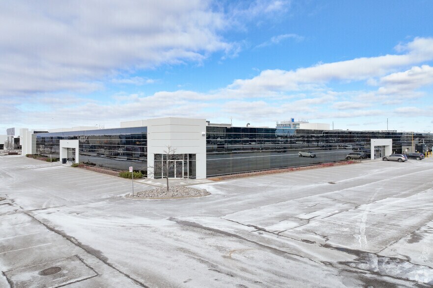 Primary Photo Of 80 Courtneypark Dr W, Mississauga Office For Lease