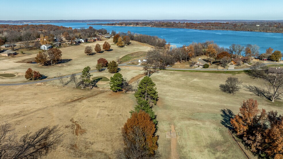 More Photos Of 519 Quail Run Rd, Grove Golf Course Driving Range For Sale