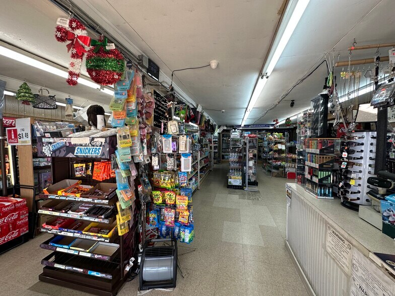 Primary Photo Of 908 College St, Bastrop Convenience Store For Sale