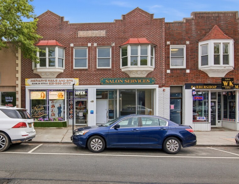 Primary Photo Of 49-59 E Main St, Riverhead Storefront For Sale
