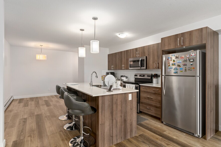 More Photos Of 303 Waddy Lane, Strathmore Multifamily For Sale